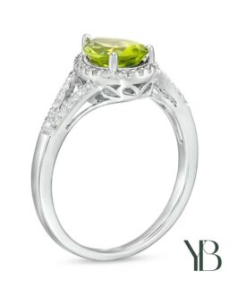 Anillo de espiga dividida con Peridoto en forma de pera y marco de Zafiro blanco en plata