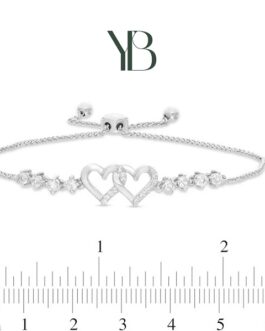 Brazalete bolo de corazones dobles de zafiro blanco en plata esterlina. 22.8cm