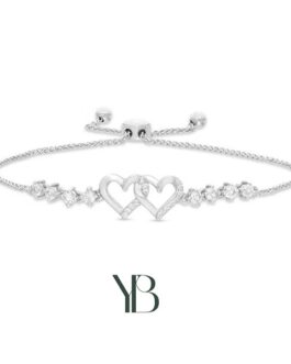 Brazalete bolo de corazones dobles de zafiro blanco en plata esterlina. 22.8cm